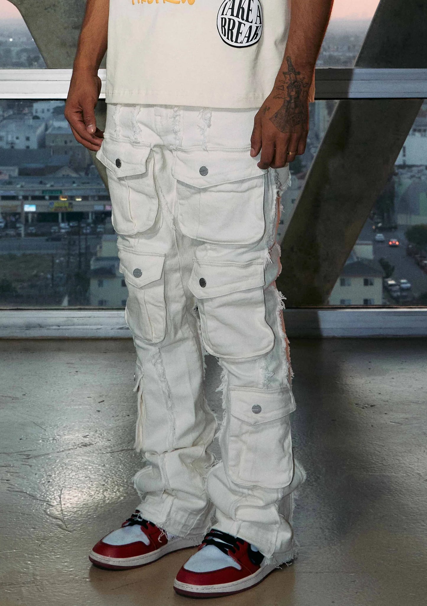 FIRST ROW CUT & SEWN WHITE PANTS WITH POCKETS